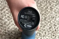The charger port and on/off button on the Ekrin 365 Massage Gun