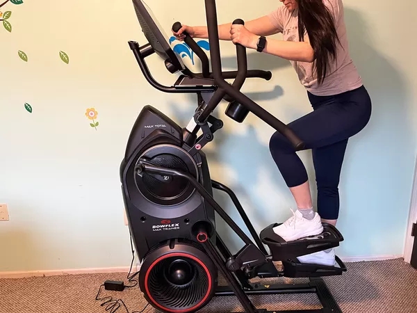 A person exercising on the BowFlex Max Total 16