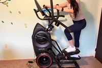 A person exercising on the BowFlex Max Total 16