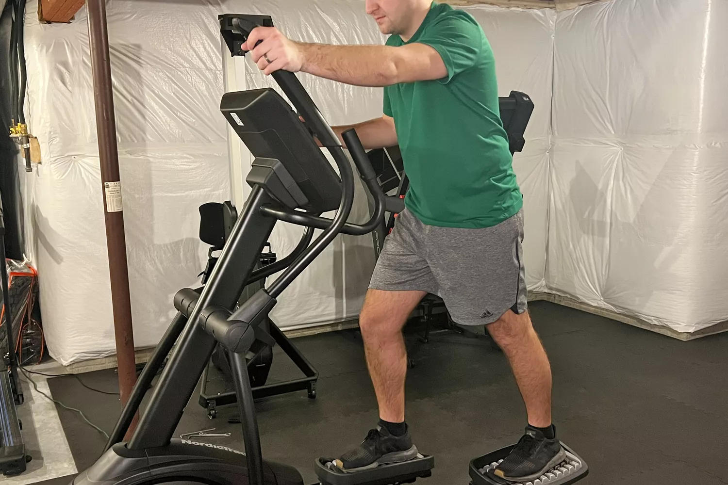 A person on the NordicTrack AirGlide 7i Elliptical