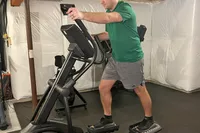 A person on the NordicTrack AirGlide 7i Elliptical