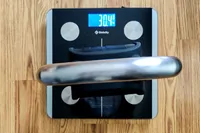 A weight on the Etekcity ESF93 Smart Fitness Scale