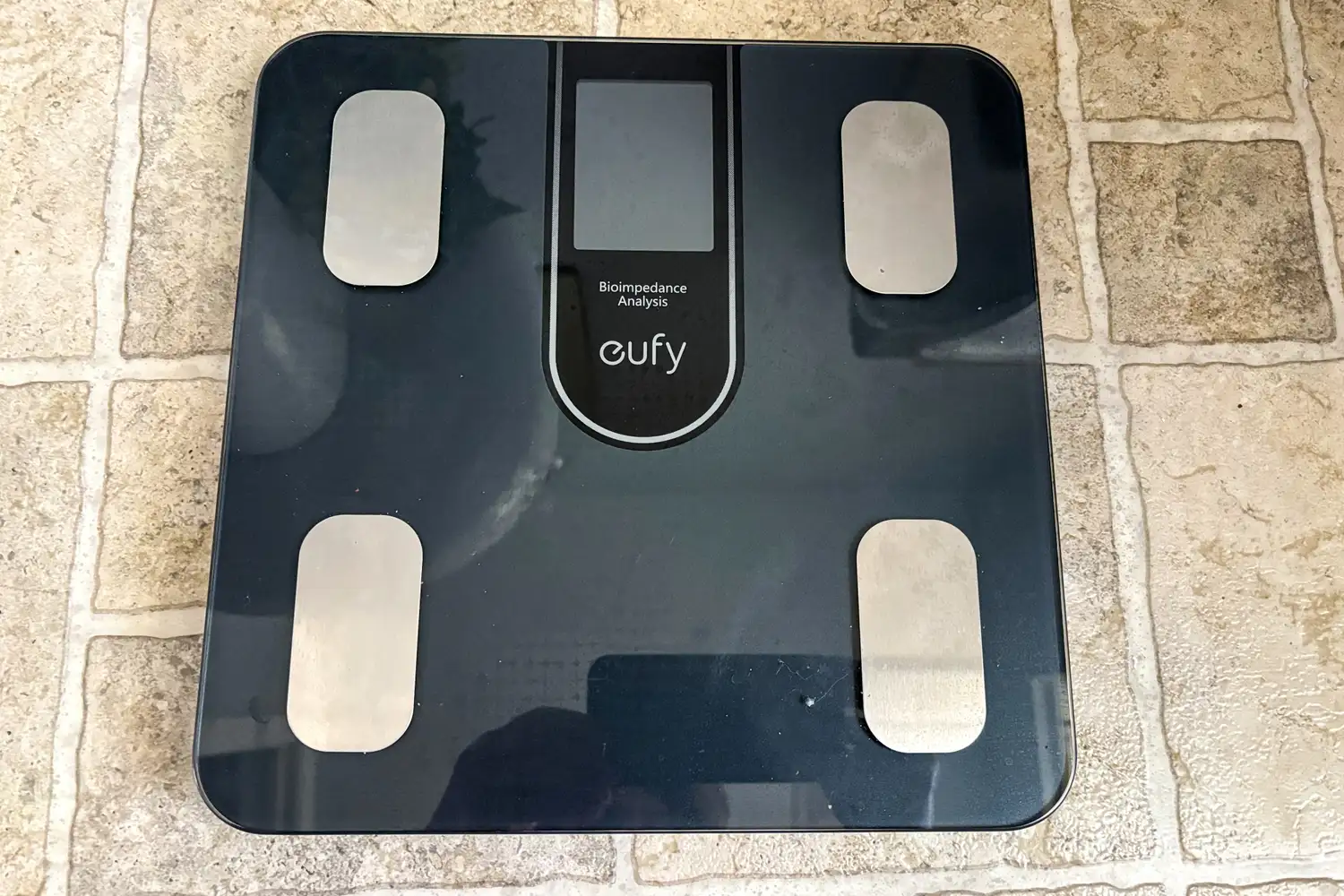 The eufy Smart Scale C20 on a tile floor