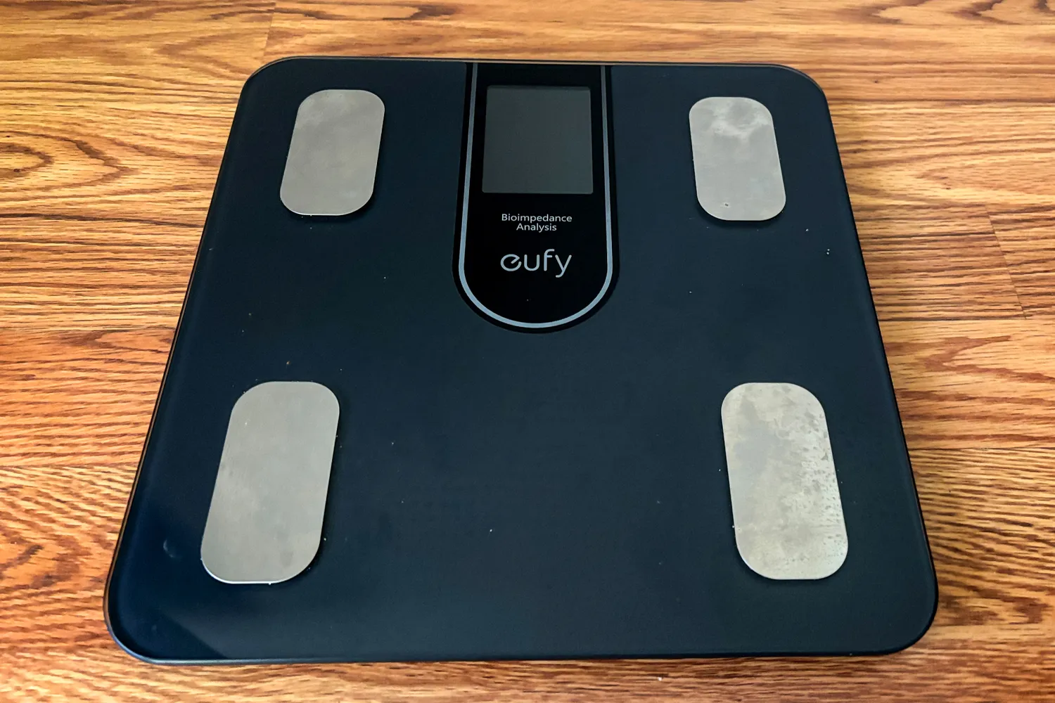 The eufy Smart Scale C20 on a wooden floor