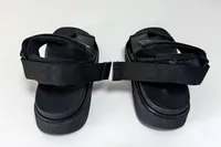 The back of a pair of FitFlop Women's GEN-FF Adjustable Webbing/Leather Back-Strap Sandals