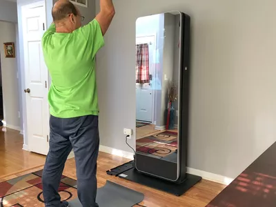 Person standing in-front of NordicTrack Vault