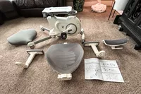 The Flexispot Deskbike V6 Pro parts and instructions on carpet