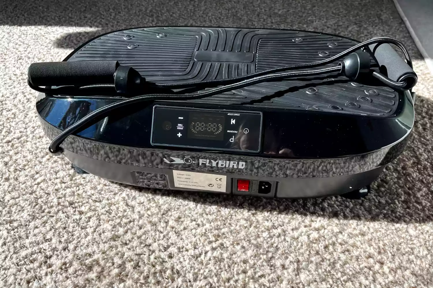 The Flybird Mini Vibration Plate on carpet