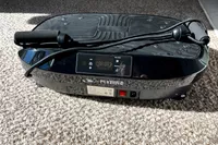 The Flybird Mini Vibration Plate on carpet