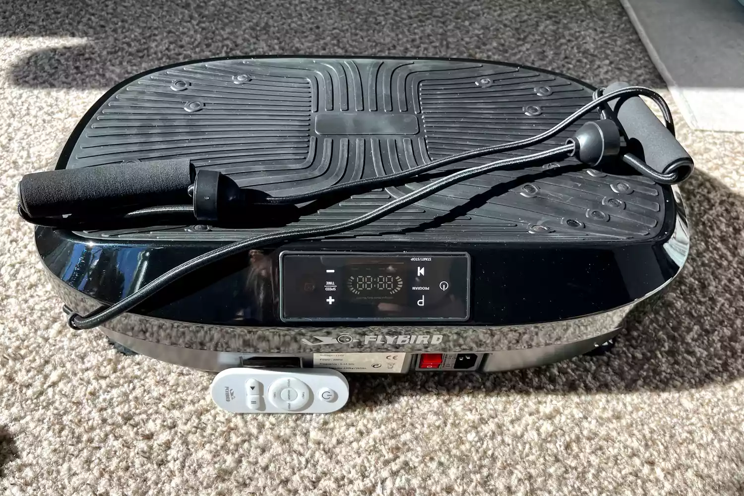 The Flybird Mini Vibration Plate with remote and resistance bands