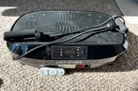 The Flybird Mini Vibration Plate with remote and resistance bands