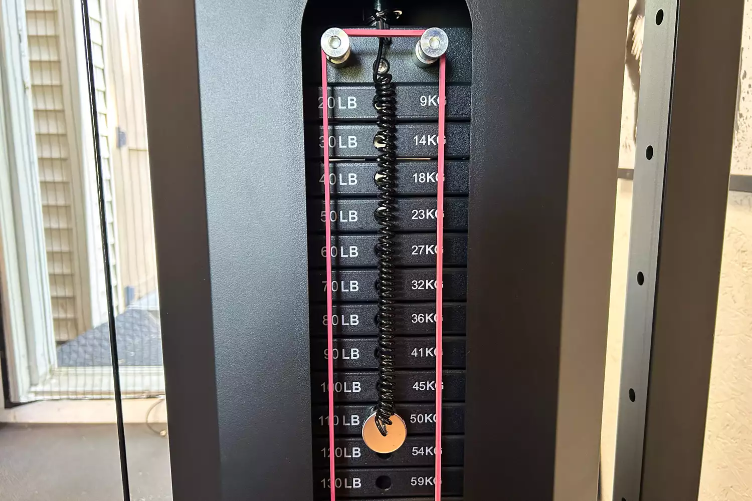 A close-up of the weight range on the Force USA G20 Pro All-In-One Trainer