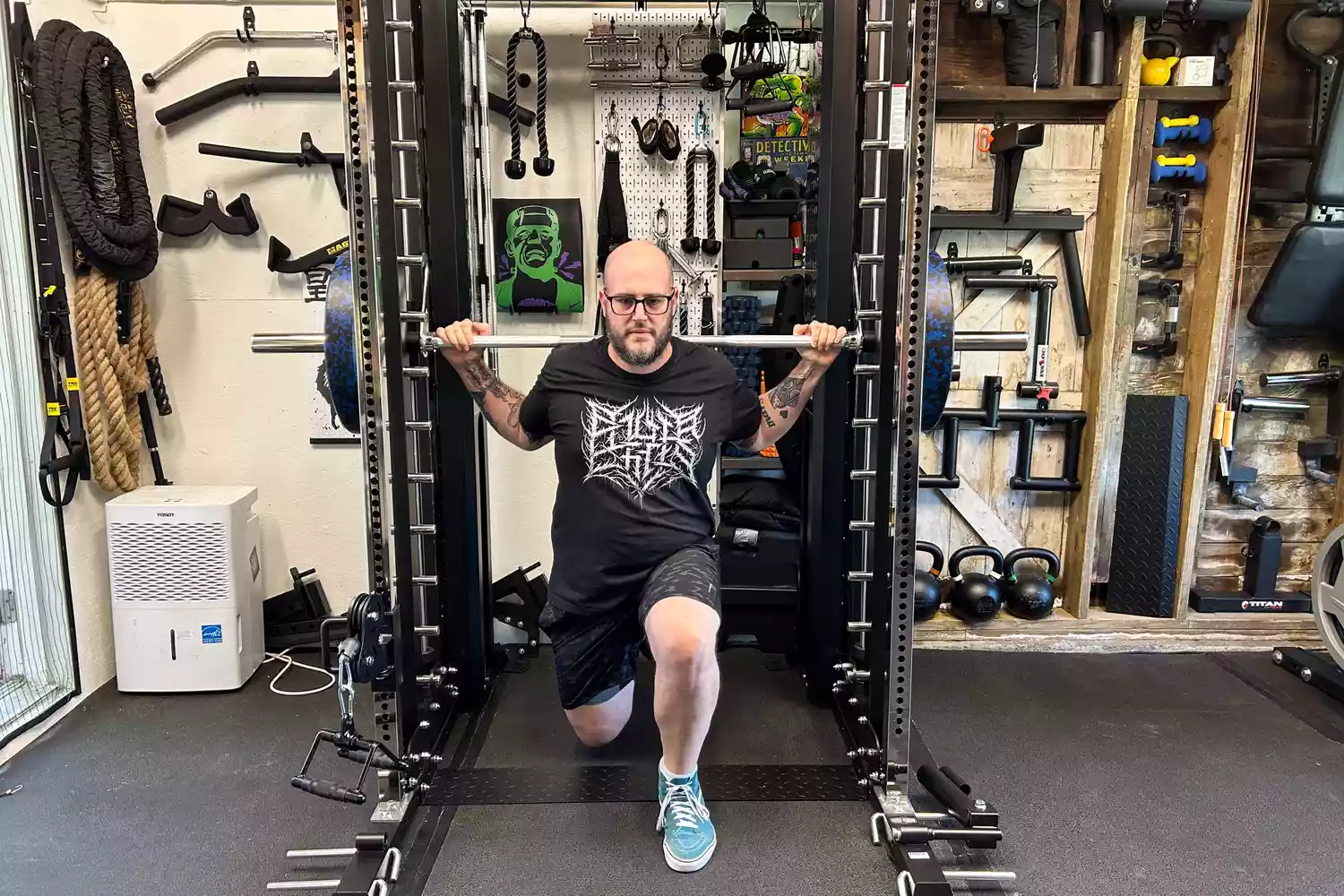 A person lifts weight on the Force USA G20 Pro All-In-One Trainer