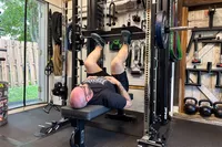 A person exercises on the Force USA G20 Pro All-In-One Trainer