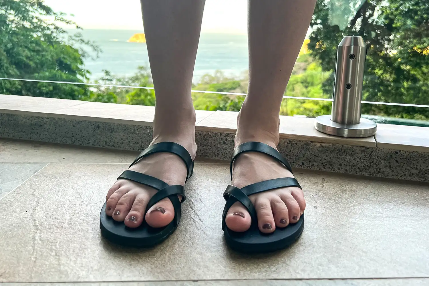 A front view of a person wearing the Frankie4 Women's Isla Slides