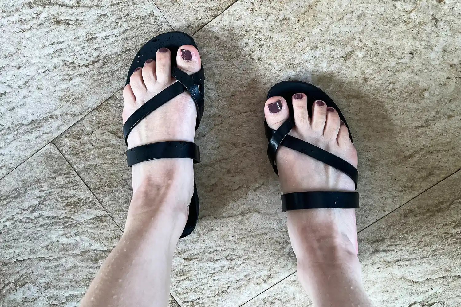 A person wears the Frankie4 Women's Isla Slides