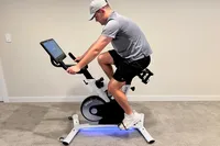 A person rides the Freebeat Boom Bike