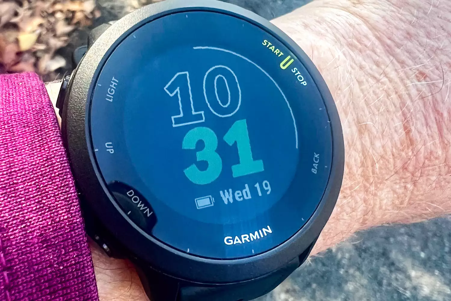 Closeup of Garmin Forerunner 55 on person's wrist
