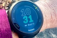 Closeup of Garmin Forerunner 55 on person's wrist