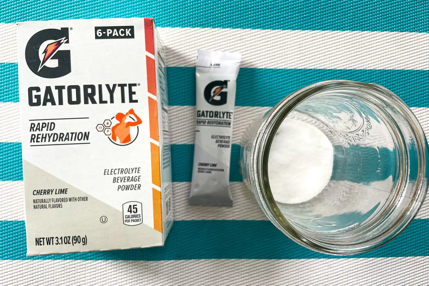 A Gatorlyte box singleserving powder packet and glass jar with powder shown