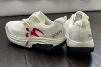 A side view of the GDEFY Men's Lauff Athletic Shoes