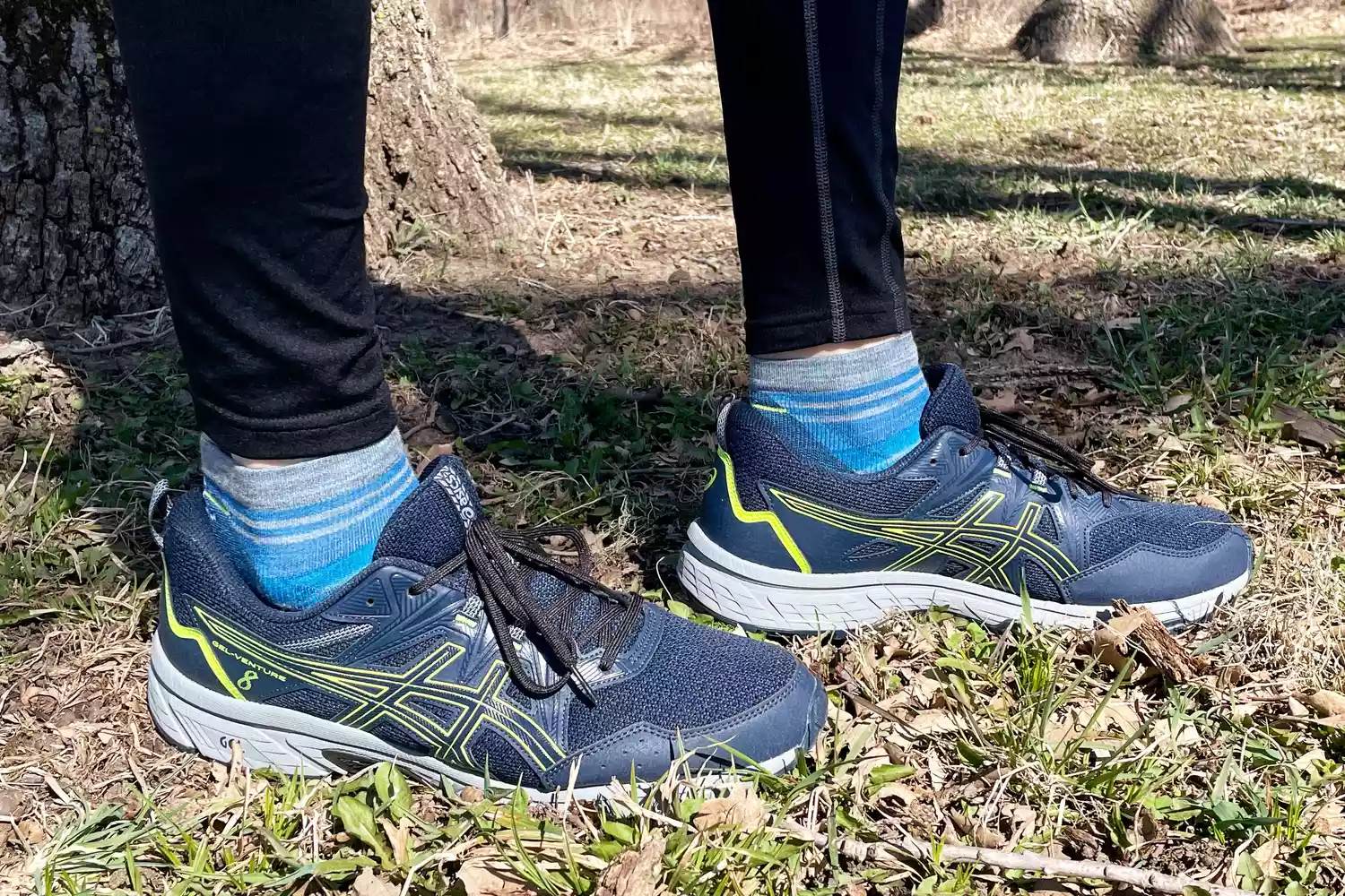 Person wearing Asics Gel-venture 8 Women's Running Shoes in grass