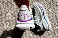 A hand showing the back of a Hoka Women's Bondi 9