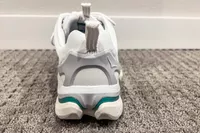 The back of the Hoka All Gender Elevon X Running Shoe