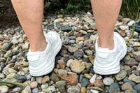 A back of a person wearing the Hoka Women's Bondi SR Road Shoes