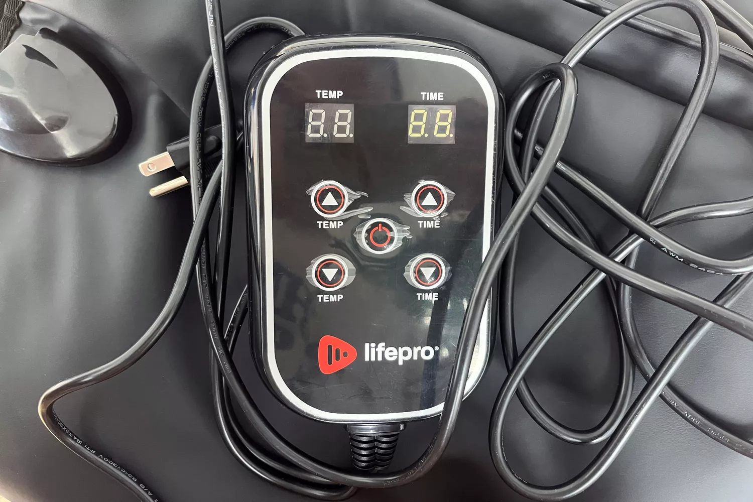 The remote control for the LifePro RejuvaWrap Infrared Sauna Blanket