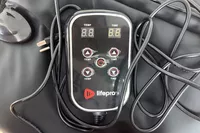 The remote control for the LifePro RejuvaWrap Infrared Sauna Blanket