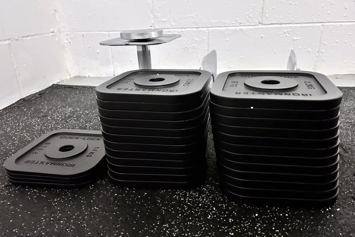 The weights for the Ironmaster Quick-Lock 75 lb Adjustable Dumbbell System Set