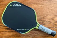 The JOOLA Anna Bright Scorpeus 3S 14mm Pickleball Paddle on a wooden table