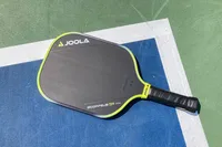 The JOOLA Anna Bright Scorpeus 3S 14mm Pickleball Paddle on a court