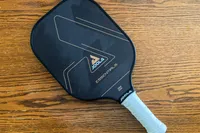 The JOOLA Essentials Pickleball Paddle on a wooden table