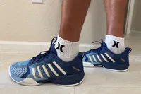 The brand name on the side of the K-Swiss Men's Pickleball Supreme Shoes