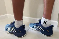 A side view of a person wearing the K-Swiss Men's Pickleball Supreme Shoes