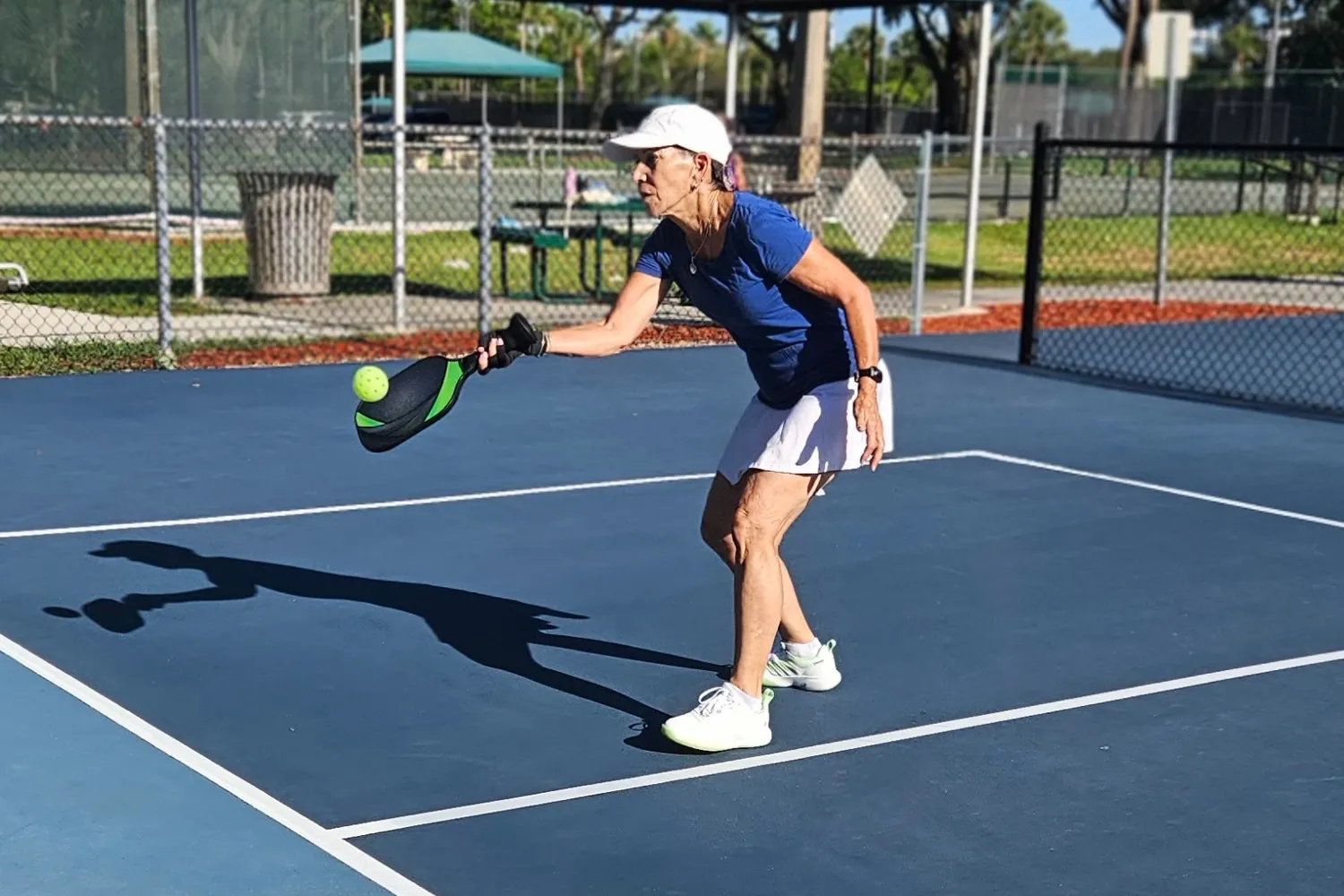 A person plays pickleball while wearing the K-Swiss Women's Ultra Court Pickleball Shoes