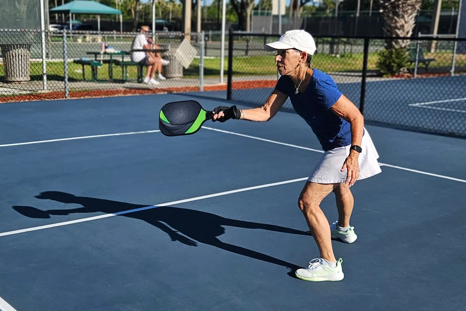 A person plays pickleball while wearing the K-Swiss Women's Ultra Court Pickleball Shoes
