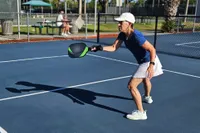 A person plays pickleball while wearing the K-Swiss Women's Ultra Court Pickleball Shoes