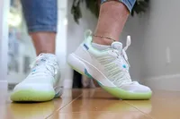 A side view of a person wearing the K-Swiss Women's Ultra Court Pickleball Shoes