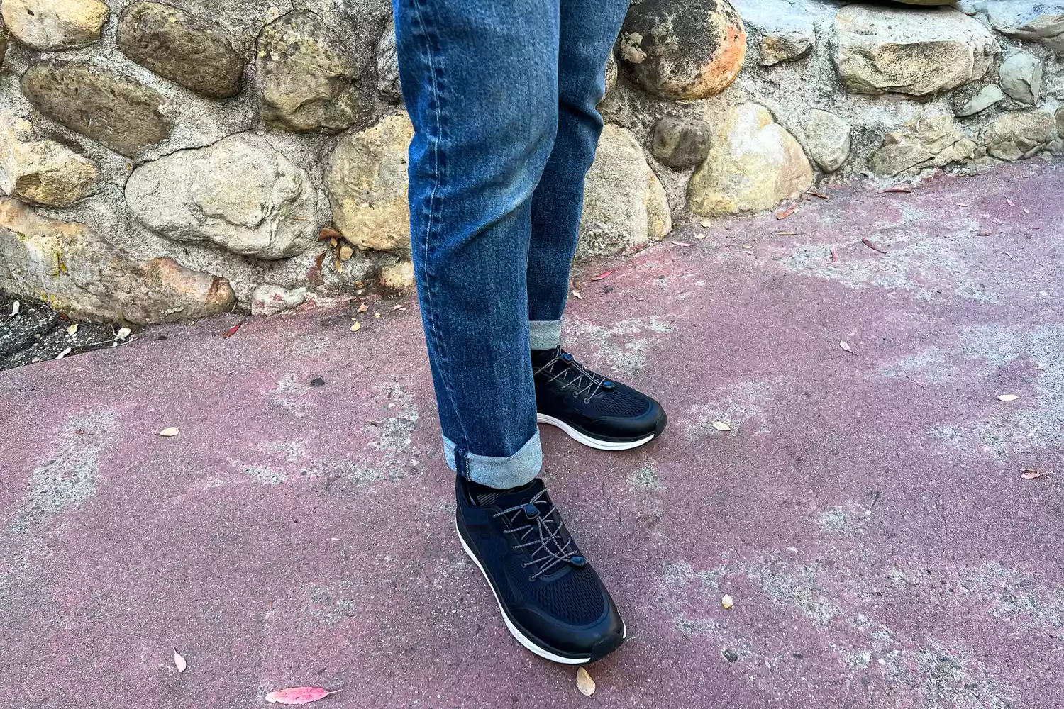 A person's legs posed in the Kizik Men's London