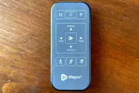 The remote for the LifePro HexaPlate Lite Vibration Plate