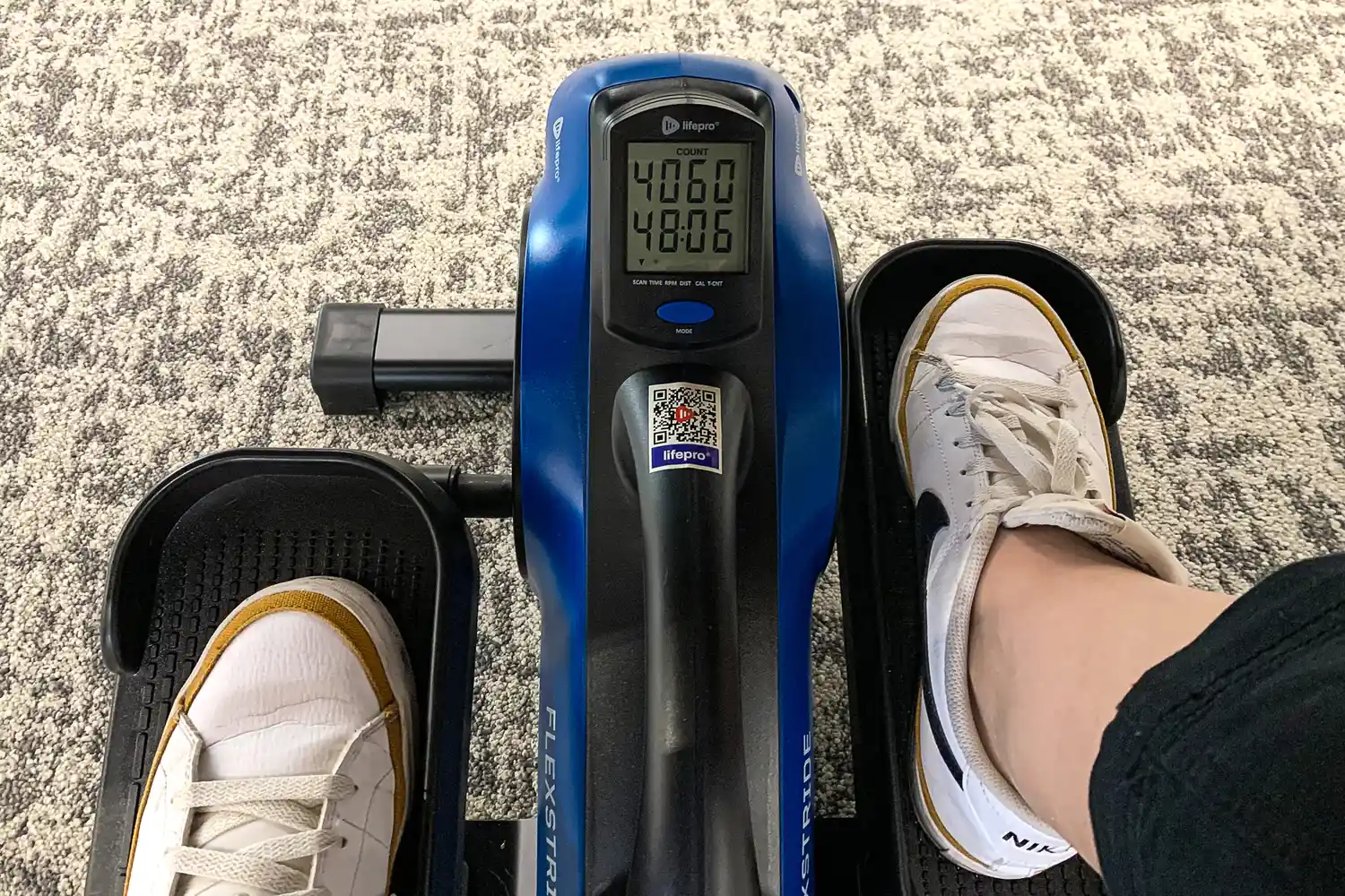 A person pedals the LifePro FlexStride Plus