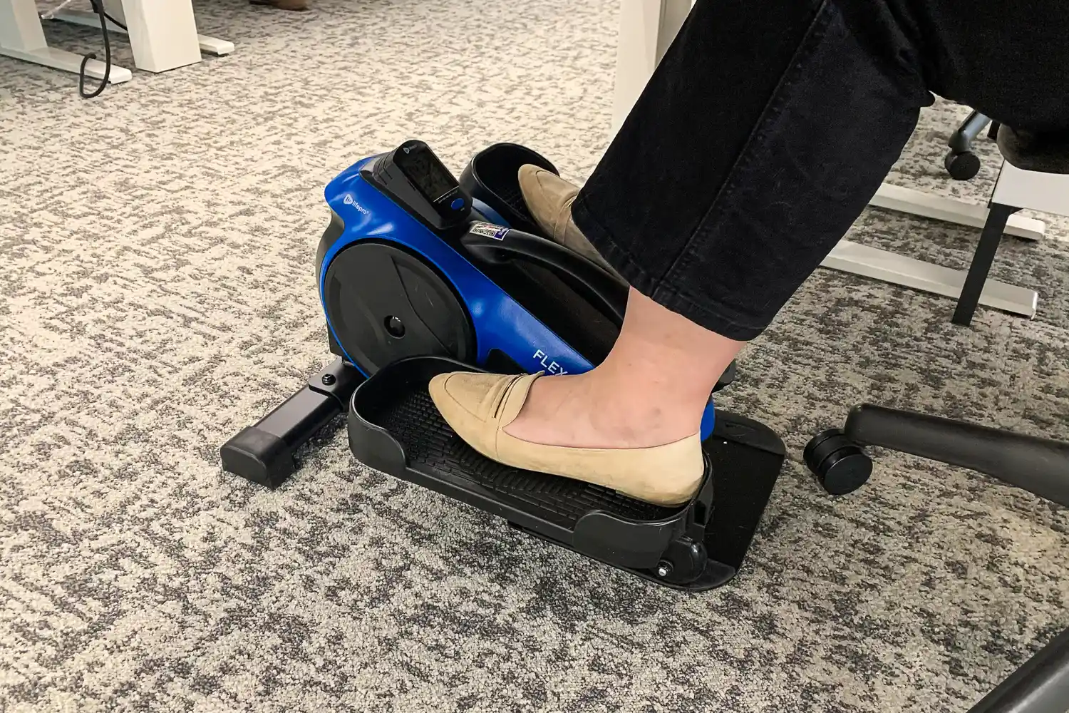 A person pedals the LifePro FlexStride Plus