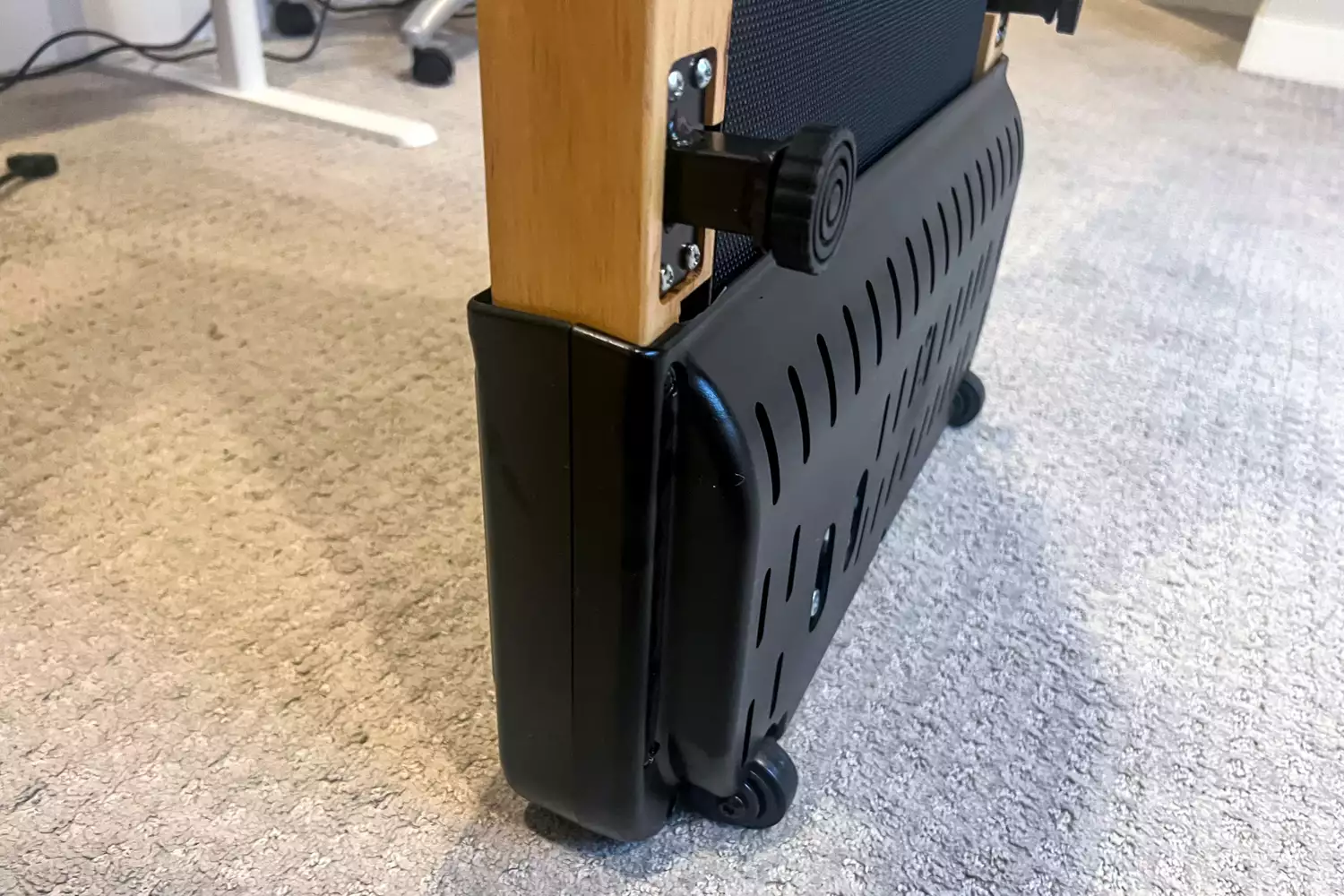 A close-up of the bottom of a standing LifePro TimberTrek Treadmill