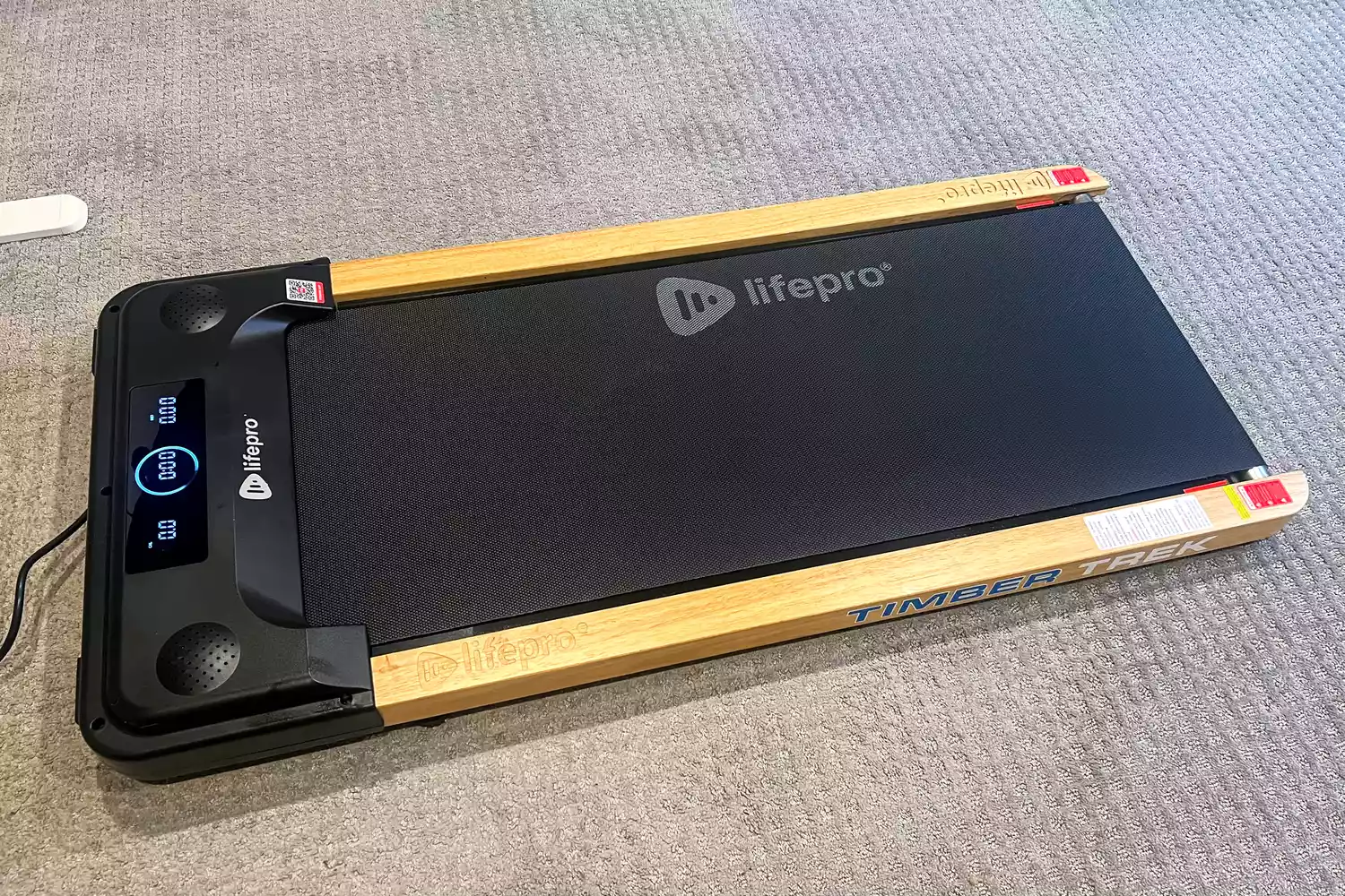 The LifePro TimberTrek Treadmill on a rug