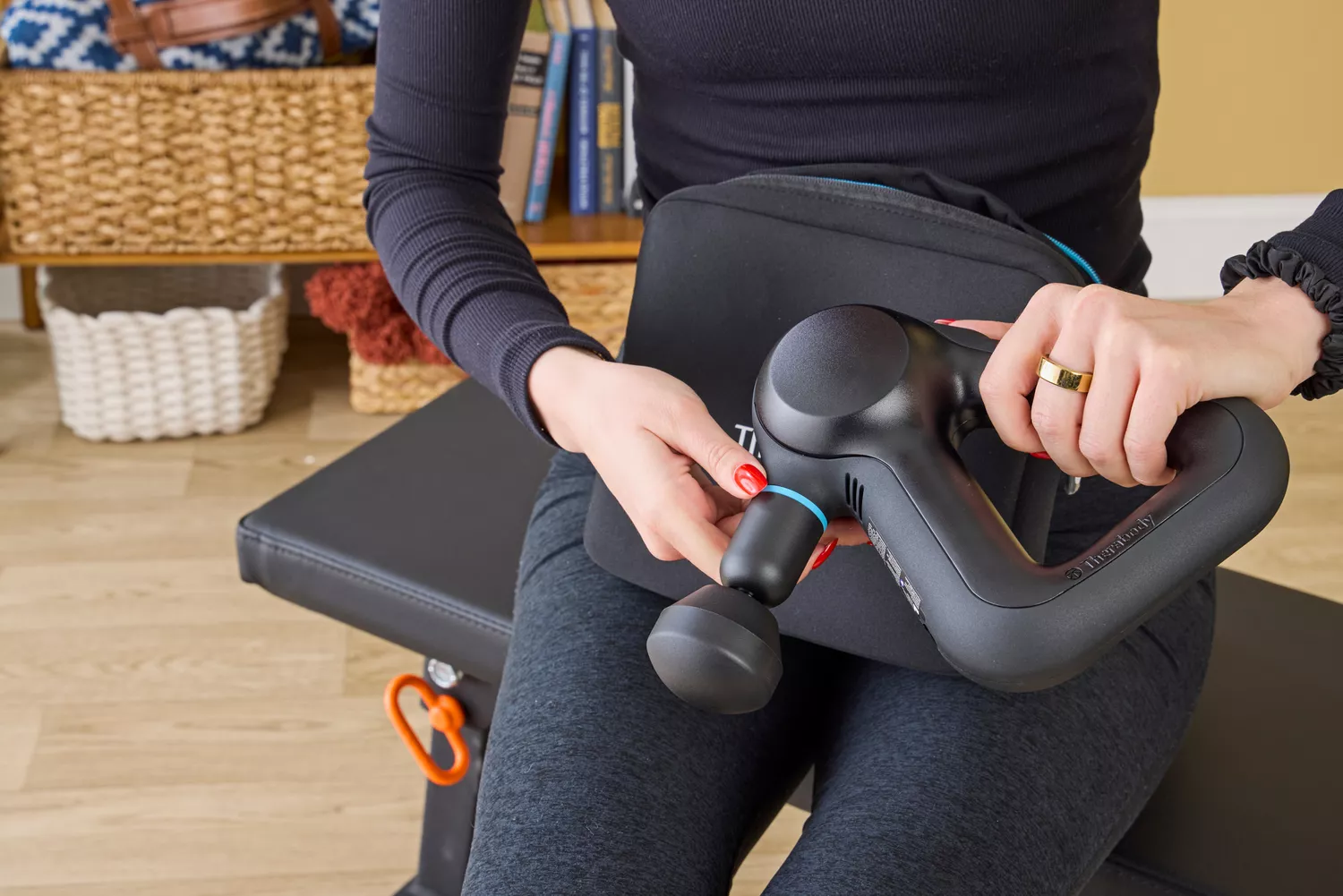 A person assembling the Theragun Prime