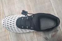 Doussprt Men’s Quick Drying Water Shoes on wood