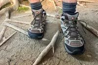 Person wearing Merrell Moab 3 Mid Waterproof Hiking Boots outside